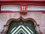 J�gerh�usle, the "hunter's hut", 1590 door lintel reproduction, faithfully carved with Roman ciphers, graces this town first officially chronicled in 1275.