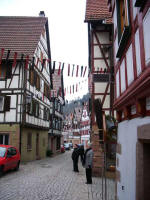 Elfriede and Eugen by the 1590 J�gerh�usle; we had so much fun traversing the well-kept medieval narrow cobblestone streets & alleys, loved Elfriede's insights on the tanners who lived outside the walled town.